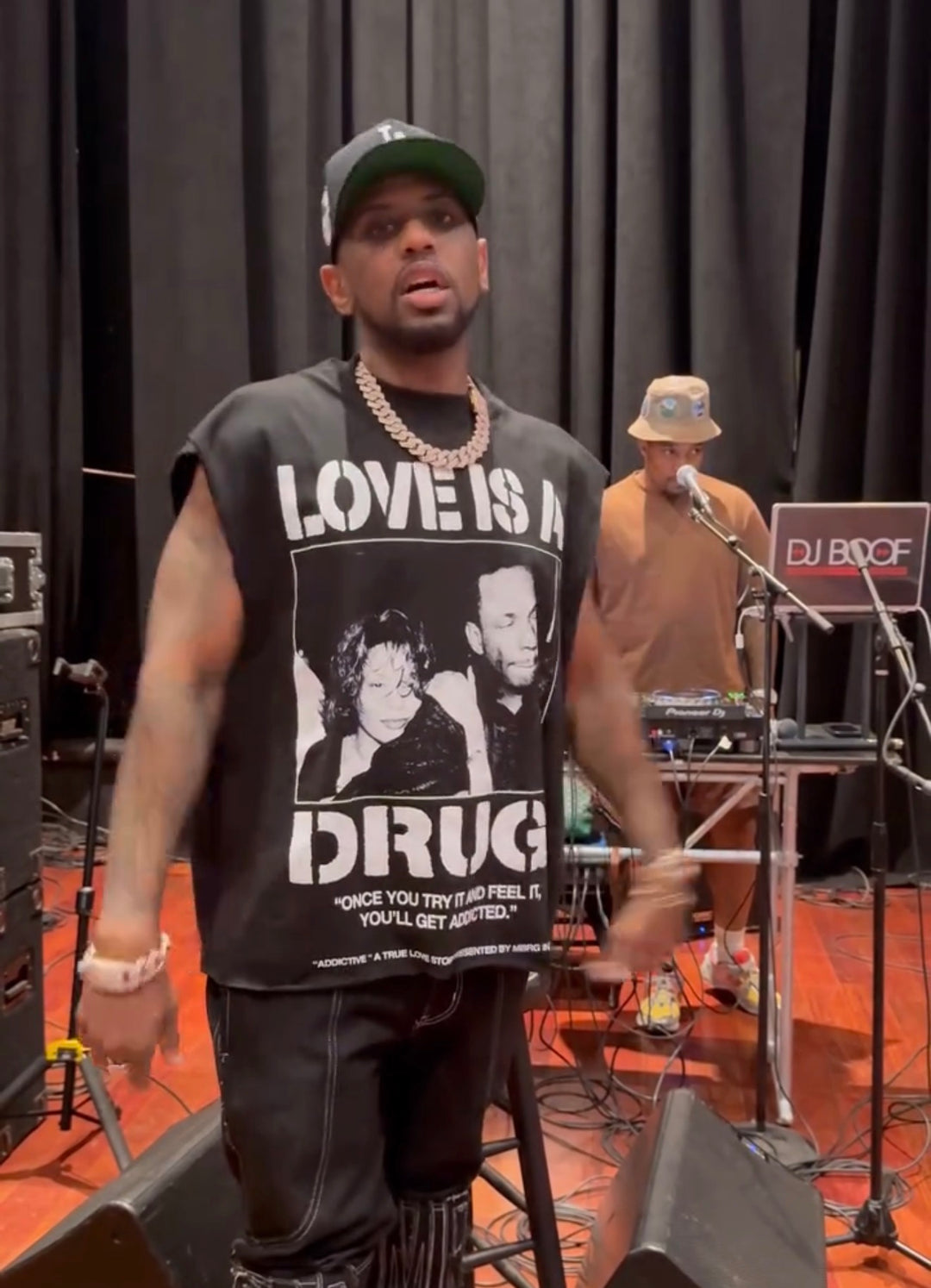 "Love Is A Drug" T-Shirt worn by Fabolous (Feat. Whitney Houston & Bobby Brown)