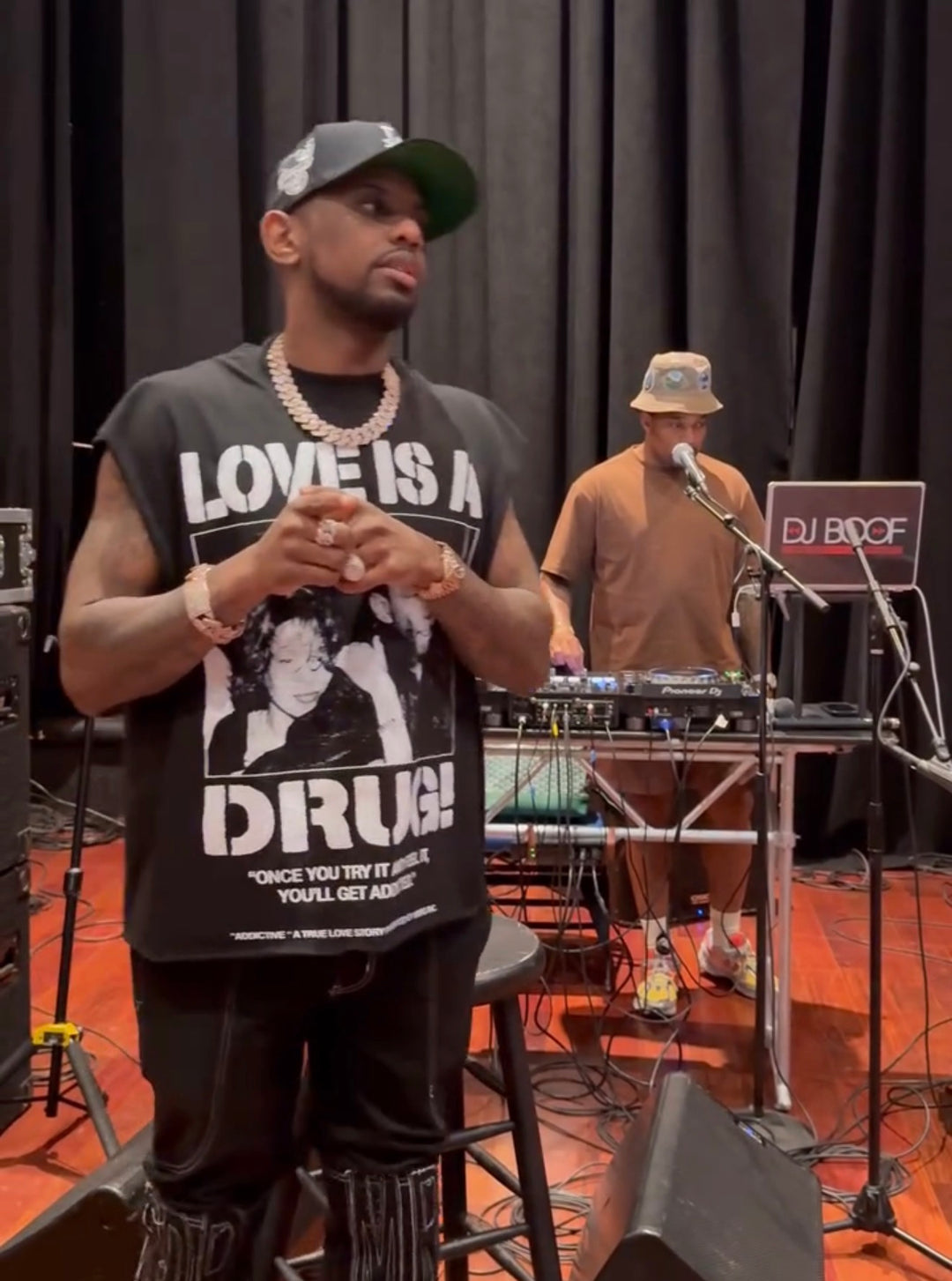 "Love Is A Drug" T-Shirt worn by Fabolous (Feat. Whitney Houston & Bobby Brown)