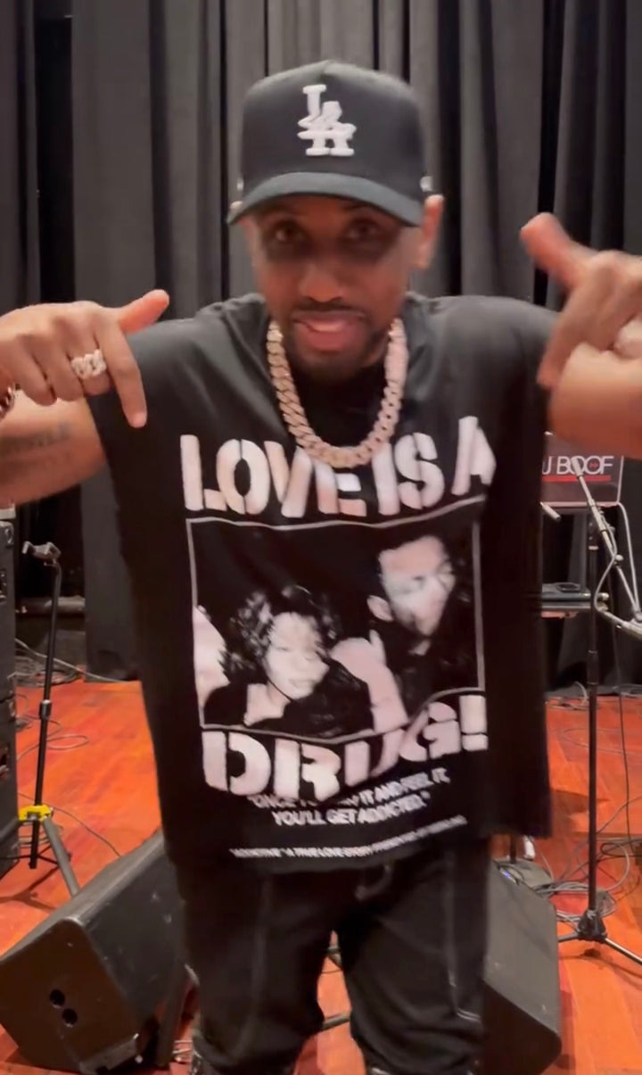 "Love Is A Drug" T-Shirt worn by Fabolous (Feat. Whitney Houston & Bobby Brown)