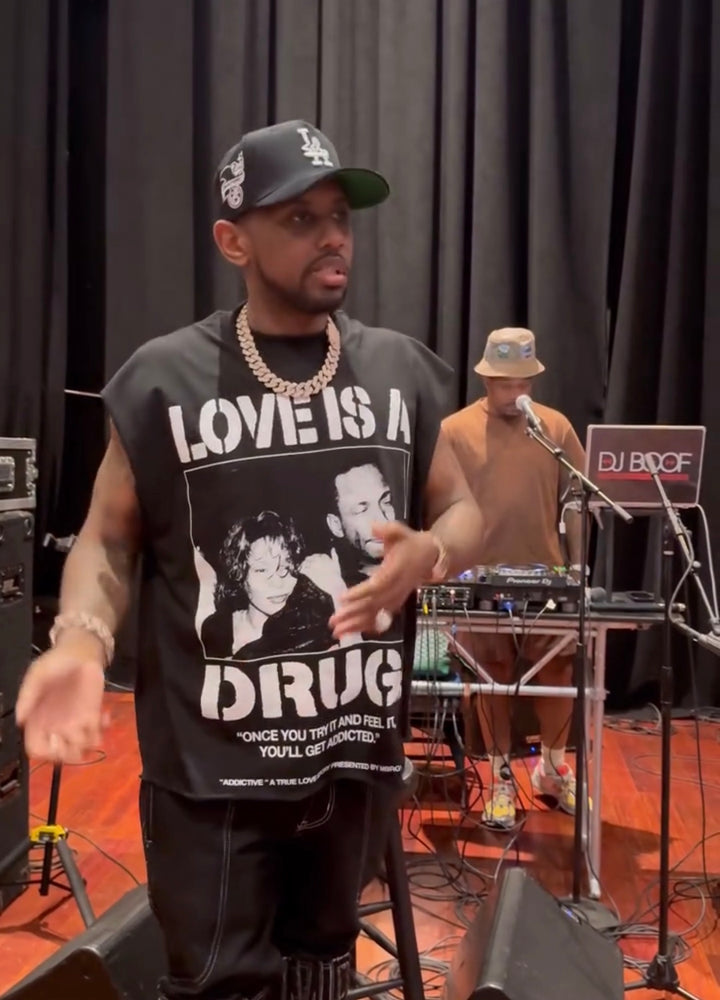 "Love Is A Drug" T-Shirt worn by Fabolous (Feat. Whitney Houston & Bobby Brown)
